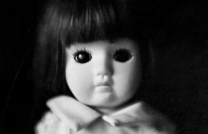 China doll with black eyes