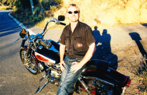 Greg Fox sitting on Harley motorbike